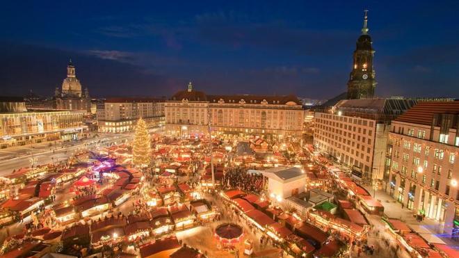 Dresden Christmas market photographed from above - many lights can be seen, creating an atmospheric mood. 