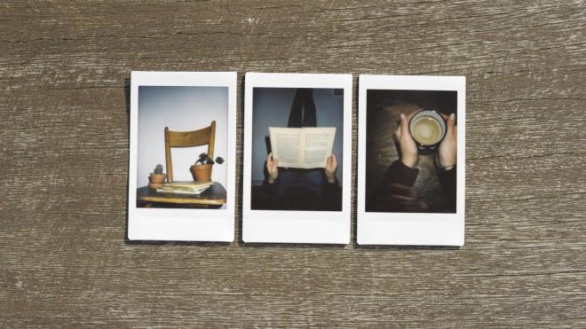 Three polaroids, one showing a plant, one showing a person reading and the third showing hands clutching a mug of coffee.